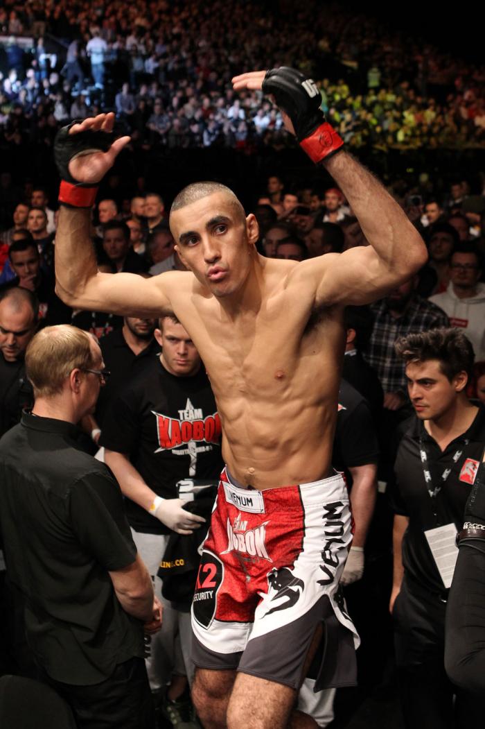 Terry Etim enters the Octagon