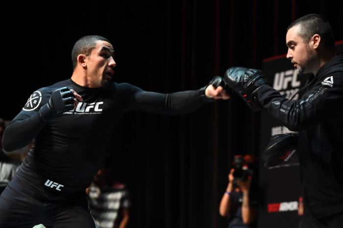 CHICAGO, ILLINOIS - JUNE 06: Robert Whittaker of New Zealand works out for fans and media during the UFC 225 Open Workouts at the Chicago Theatre on June 6, 2018 in Chicago, Illinois. (Photo by Josh Hedges/Zuffa LLC/Zuffa LLC via Getty Images)