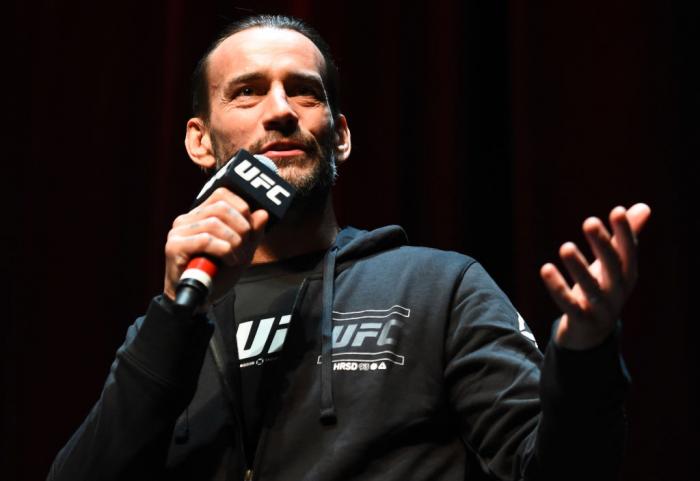 CHICAGO, ILLINOIS - JUNE 06: CM Punk interacts with fans during the UFC 225 Open Workouts at the Chicago Theatre on June 6, 2018 in Chicago, Illinois. (Photo by Josh Hedges/Zuffa LLC/Zuffa LLC via Getty Images)