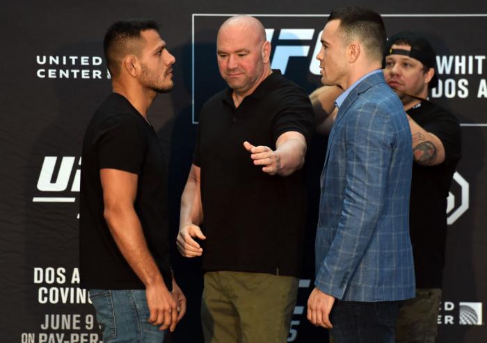 CHICAGO, ILLINOIS - JUNE 07: (L-R) Opponents Rafael Dos Anjos of Brazil and Colby Covington face off during the UFC 225 Ultimate Media Day at the United Center on June 7, 2018 in Chicago, Illinois. (Photo by Josh Hedges/Zuffa LLC/Zuffa LLC via Getty Ima