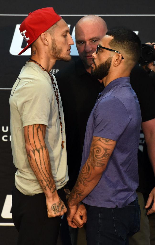 CHICAGO, ILLINOIS - JUNE 07: (L-R) Opponents Mike Santiago and Dan Ige face off during the UFC 225 Ultimate Media Day at the United Center on June 7, 2018 in Chicago, Illinois. (Photo by Josh Hedges/Zuffa LLC/Zuffa LLC via Getty Images)