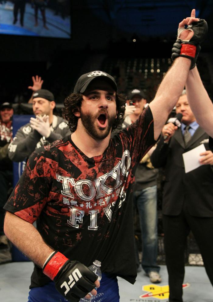 Charlie Brenneman celebrates his win over Alves.
