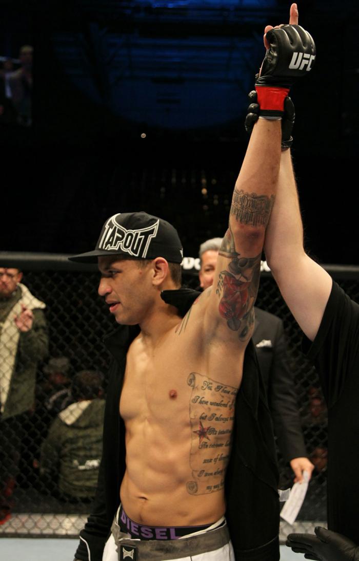 DaMarques Johnson celebrates his win over Mike Guymon.
