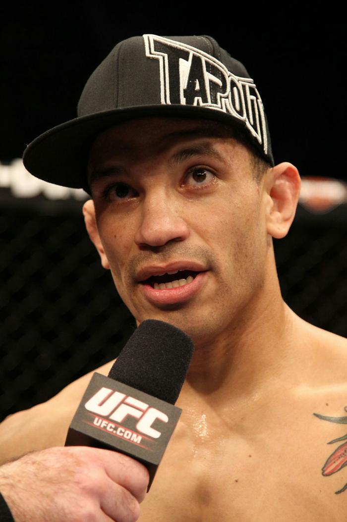 DaMarques Johnson celebrates his win over Mike Guymon.