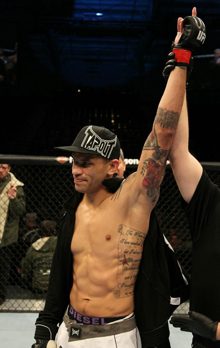 DaMarques Johnson celebrates his win over Mike Guymon.