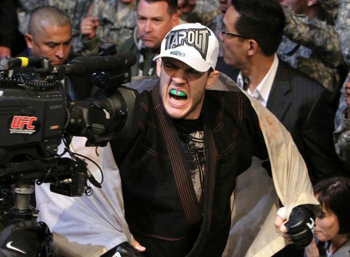 Cole Miller enters the arena.