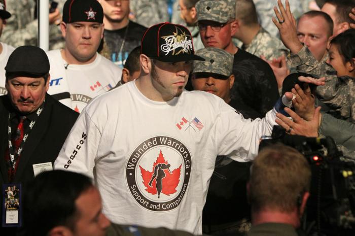 Tim Hague enters the arena.