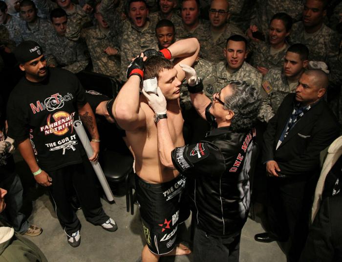 Matt Mitrione enters the arena.