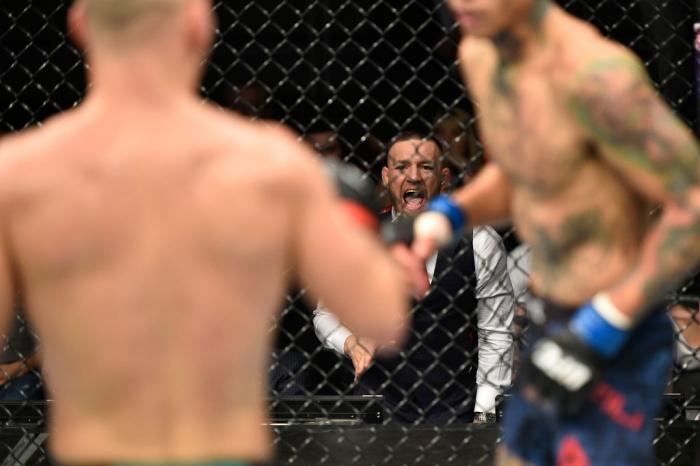 GDANSK, POLAND - OCTOBER 21: UFC lightweight champion Conor McGregor cheers on teammate Artem Lobov in his featherweight bout against Andre Fili during the UFC Fight Night event inside Ergo Arena on October 21, 2017 in Gdansk, Poland. (Photo by Jeff Botta