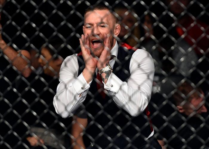 GDANSK, POLAND - OCTOBER 21: UFC lightweight champion Conor McGregor cheers on teammate Artem Lobov in his featherweight bout against Andre Fili during the UFC Fight Night event inside Ergo Arena on October 21, 2017 in Gdansk, Poland. (Photo by Jeff Botta