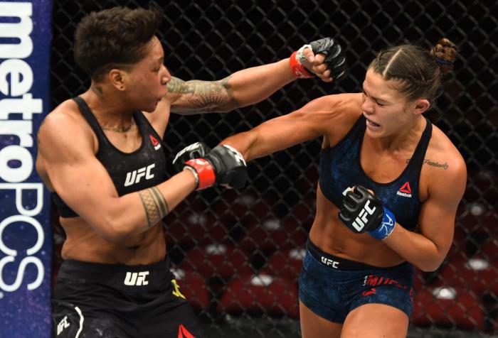 GLENDALE, AZ - APRIL 14: (R-L) Lauren Mueller punches Shana Dobson in their women's flyweight fight during the UFC Fight Night event at the Gila Rivera Arena on April 14, 2018 in Glendale, Arizona. (Photo by Josh Hedges/Zuffa LLC/Zuffa LLC via Getty Imag