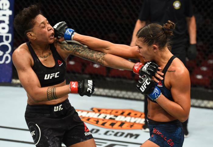 GLENDALE, AZ - APRIL 14: (R-L) Lauren Mueller punches Shana Dobson in their women's flyweight fight during the UFC Fight Night event at the Gila Rivera Arena on April 14, 2018 in Glendale, Arizona. (Photo by Josh Hedges/Zuffa LLC/Zuffa LLC via Getty Imag