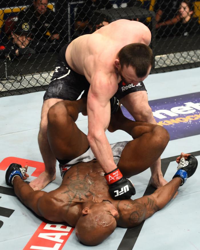 GLENDALE, AZ - APRIL 14: Muslim Salikhov of Russia (top) punches Ricky Rainey in their welterweight fight during the UFC Fight Night event at the Gila Rivera Arena on April 14, 2018 in Glendale, Arizona. (Photo by Josh Hedges/Zuffa LLC/Zuffa LLC via Gett