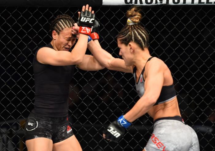 GLENDALE, AZ - APRIL 14: (R-L) Cortney Casey punches Michelle Waterson in their womens strawweight fight during the UFC Fight Night event at the Gila Rivera Arena on April 14, 2018 in Glendale, Arizona. (Photo by Josh Hedges/Zuffa LLC/Zuffa LLC via Getty
