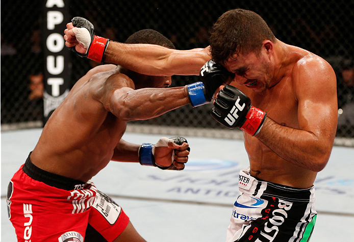 BELO HORIZONTE, BRAZIL - SEPTEMBER 04: (L-R) Sean Spencer punches Yuri Villefort in the welterweight fight during the UFC on FOX Sports 1 event at Mineirinho Arena on September 4, 2013 in Belo Horizonte, Brazil. (Photo by Josh Hedges/Zuffa LLC/Zuffa LLC