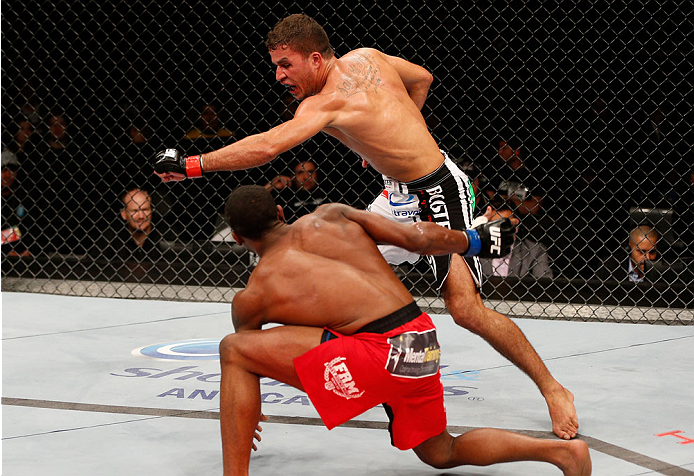 BELO HORIZONTE, BRAZIL - SEPTEMBER 04: (R-L) Yuri Villefort punches Sean Spencer in the welterweight fight during the UFC on FOX Sports 1 event at Mineirinho Arena on September 4, 2013 in Belo Horizonte, Brazil. (Photo by Josh Hedges/Zuffa LLC/Zuffa LLC