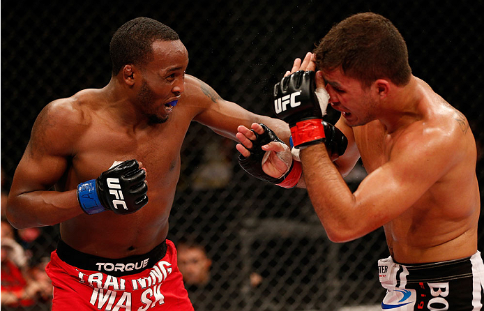 BELO HORIZONTE, BRAZIL - SEPTEMBER 04: (L-R) Sean Spencer punches Yuri Villefort in the welterweight fight during the UFC on FOX Sports 1 event at Mineirinho Arena on September 4, 2013 in Belo Horizonte, Brazil. (Photo by Josh Hedges/Zuffa LLC/Zuffa LLC