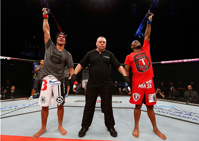 BELO HORIZONTE, BRAZIL - SEPTEMBER 04: Yuri Villefort (L) and Sean Spencer reacts as the judges' scores are read after their welterweight fight during the UFC on FOX Sports 1 event at Mineirinho Arena on September 4, 2013 in Belo Horizonte, Brazil. (Phot