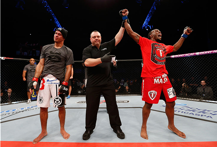 BELO HORIZONTE, BRAZIL - SEPTEMBER 04: Sean Spencer (R) reacts after defeating Yuri Villefort in the welterweight fight during the UFC on FOX Sports 1 event at Mineirinho Arena on September 4, 2013 in Belo Horizonte, Brazil. (Photo by Josh Hedges/Zuffa L