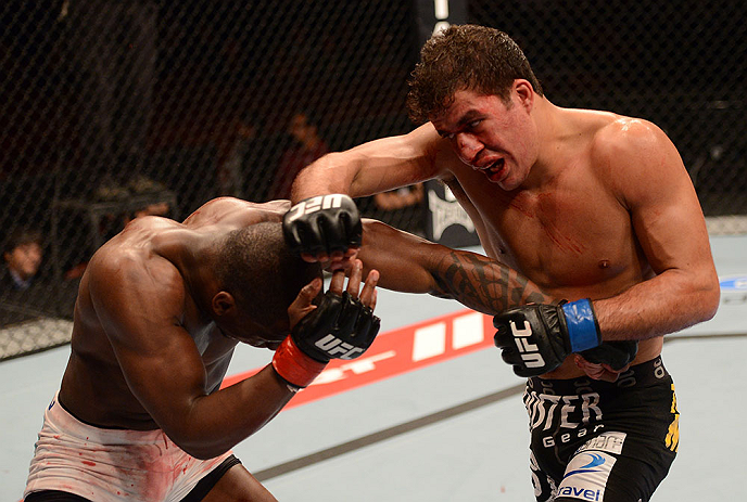 ANAHEIM, CA - FEBRUARY 23: (R-L) Yuri Villefort punches Nah-Shon Burrell in their welterweight bout during UFC 157 at Honda Center on February 23, 2013 in Anaheim, California. (Photo by Donald Miralle/Zuffa LLC/Zuffa LLC via Getty Images) *** Local Capt