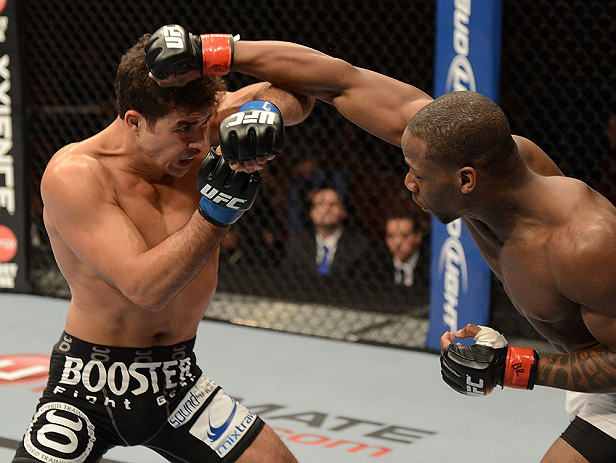 ANAHEIM, CA - FEBRUARY 23: (R-L) Nah-Shon Burrell punches Yuri Villefort in their welterweight bout during UFC 157 at Honda Center on February 23, 2013 in Anaheim, California. (Photo by Donald Miralle/Zuffa LLC/Zuffa LLC via Getty Images) *** Local Capt