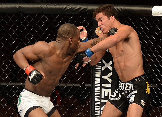 ANAHEIM, CA - FEBRUARY 23: (L-R) Nah-Shon Burrell punches Yuri Villefort in their welterweight bout during UFC 157 at Honda Center on February 23, 2013 in Anaheim, California. (Photo by Donald Miralle/Zuffa LLC/Zuffa LLC via Getty Images) *** Local Capt