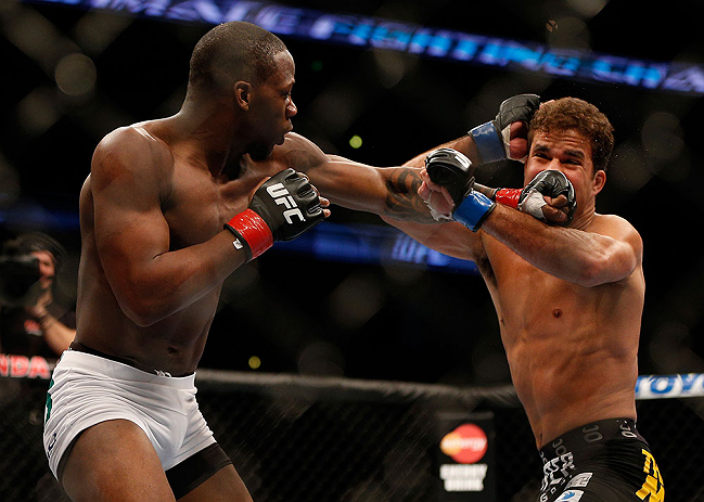 ANAHEIM, CA - FEBRUARY 23: (L-R) Nah-Shon Burrell punches Yuri Villefort in their welterweight bout during UFC 157 at Honda Center on February 23, 2013 in Anaheim, California. (Photo by Josh Hedges/Zuffa LLC/Zuffa LLC via Getty Images) *** Local Caption