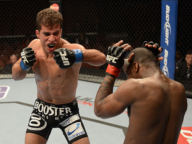 ANAHEIM, CA - FEBRUARY 23: (L-R) Yuri Villefort punches Nah-Shon Burrellin their welterweight bout during UFC 157 at Honda Center on February 23, 2013 in Anaheim, California. (Photo by Donald Miralle/Zuffa LLC/Zuffa LLC via Getty Images) *** Local Capti