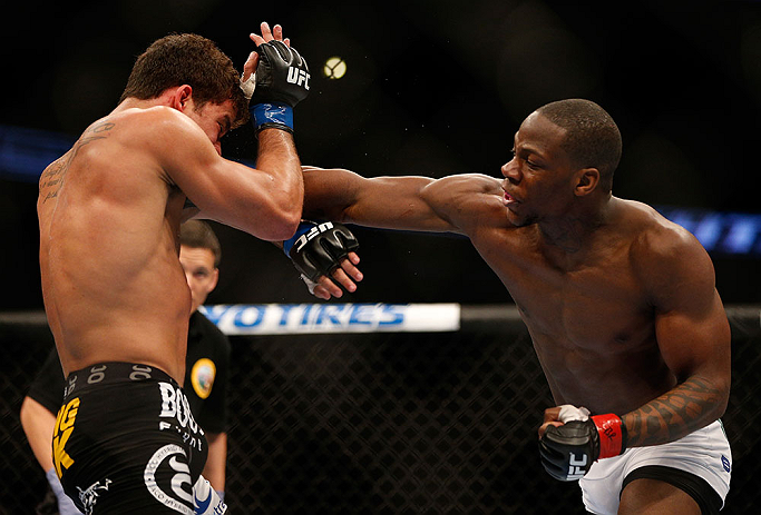 ANAHEIM, CA - FEBRUARY 23: (R-L) Nah-Shon Burrell punches Yuri Villefort in their welterweight bout during UFC 157 at Honda Center on February 23, 2013 in Anaheim, California. (Photo by Josh Hedges/Zuffa LLC/Zuffa LLC via Getty Images) *** Local Caption
