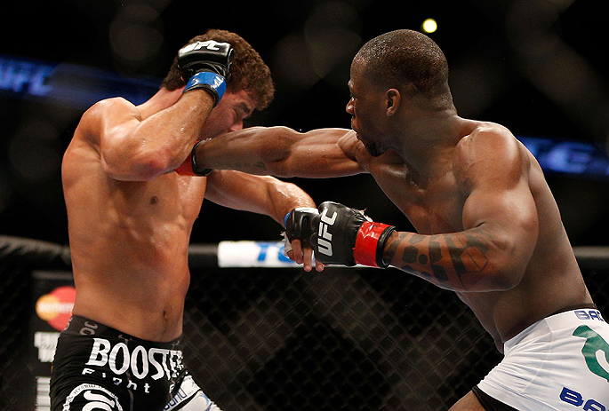 ANAHEIM, CA - FEBRUARY 23: (R-L) Nah-Shon Burrell punches Yuri Villefort in their welterweight bout during UFC 157 at Honda Center on February 23, 2013 in Anaheim, California. (Photo by Josh Hedges/Zuffa LLC/Zuffa LLC via Getty Images) *** Local Caption