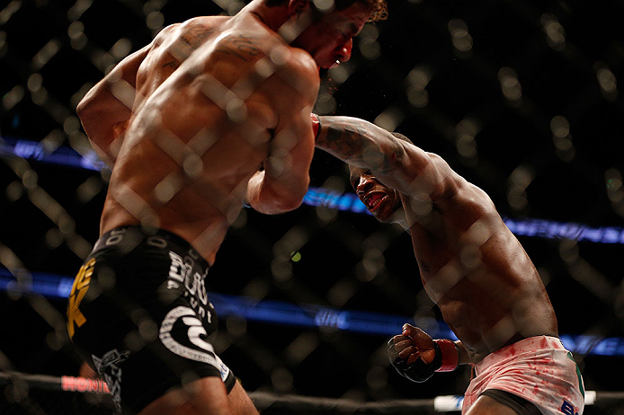 ANAHEIM, CA - FEBRUARY 23: (R-L) Nah-Shon Burrell punches Yuri Villefort in their welterweight bout during UFC 157 at Honda Center on February 23, 2013 in Anaheim, California. (Photo by Josh Hedges/Zuffa LLC/Zuffa LLC via Getty Images) *** Local Caption
