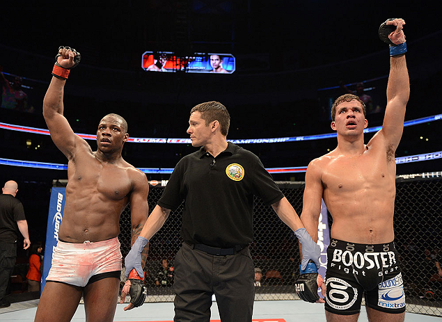 ANAHEIM, CA - FEBRUARY 23: Nah-Shon Burrell (left) and Yuri Villefort await the official decision after their welterweight bout during UFC 157 at Honda Center on February 23, 2013 in Anaheim, California. (Photo by Donald Miralle/Zuffa LLC/Zuffa LLC via