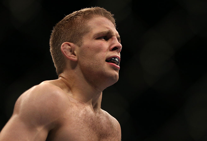 DENVER, CO - AUGUST 11: Nik Lentz reacts after defeating Eiji Mitsuoka during their featherweight bout at UFC 150 inside Pepsi Center on August 11, 2012 in Denver, Colorado. (Photo by Josh Hedges/Zuffa LLC/Zuffa LLC via Getty Images)