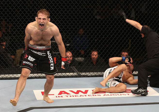 DENVER, CO - AUGUST 11: Nik Lentz (L) reacts after defeating Eiji Mitsuoka during their featherweight bout at UFC 150 inside Pepsi Center on August 11, 2012 in Denver, Colorado. (Photo by Nick Laham/Zuffa LLC/Zuffa LLC via Getty Images)