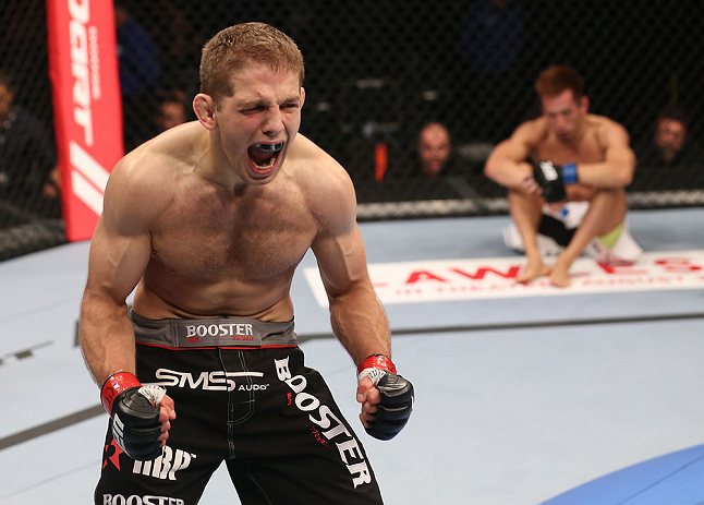 DENVER, CO - AUGUST 11: Nik Lentz (L) reacts after defeating Eiji Mitsuoka during their featherweight bout at UFC 150 inside Pepsi Center on August 11, 2012 in Denver, Colorado. (Photo by Nick Laham/Zuffa LLC/Zuffa LLC via Getty Images)