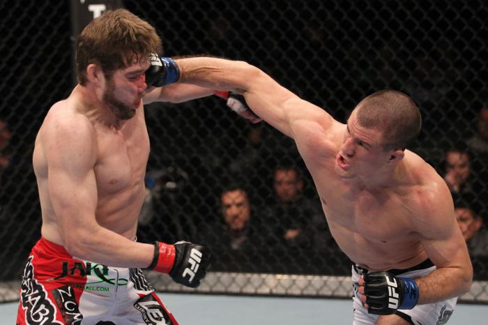 TORONTO, ON - DECEMBER 10: (R-L) John Cholish punches Mitch Clarke during the UFC 140 event at Air Canada Centre on December 10, 2011 in Toronto, Canada. (Photo by Nick Laham/Zuffa LLC/Zuffa LLC)