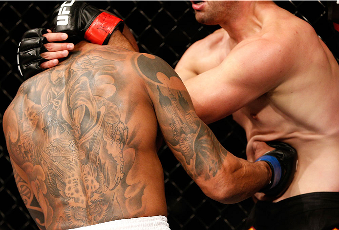 BELO HORIZONTE, BRAZIL - SEPTEMBER 04: (L-R) Ivan Jorge punches the body of Keith Wisniewski in their welterweight fight during the UFC on FOX Sports 1 event at Mineirinho Arena on September 4, 2013 in Belo Horizonte, Brazil. (Photo by Josh Hedges/Zuffa
