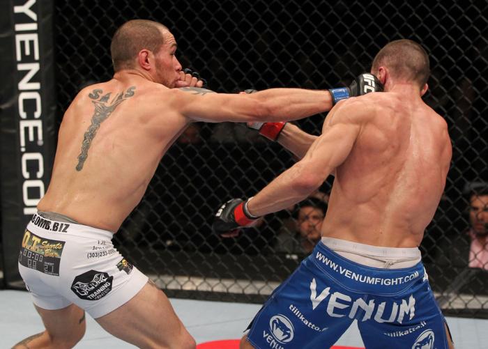 OMAHA, NE - FEBRUARY 15: (L-R) Justin Salas punches Anton Kuivanen during the UFC on FUEL TV event at Omaha Civic Auditorium on February 15, 2012 in Omaha, Nebraska. (Photo by Josh Hedges/Zuffa LLC/Zuffa LLC via Getty Images) *** Local Caption *** Anton