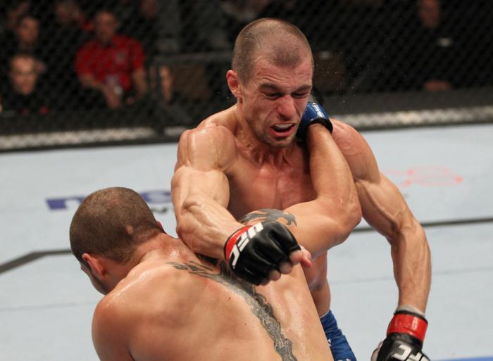 OMAHA, NE - FEBRUARY 15: (L-R) Justin Salas and Anton Kuivanen trade punches during the UFC on FUEL TV event at Omaha Civic Auditorium on February 15, 2012 in Omaha, Nebraska. (Photo by Josh Hedges/Zuffa LLC/Zuffa LLC via Getty Images) *** Local Caption