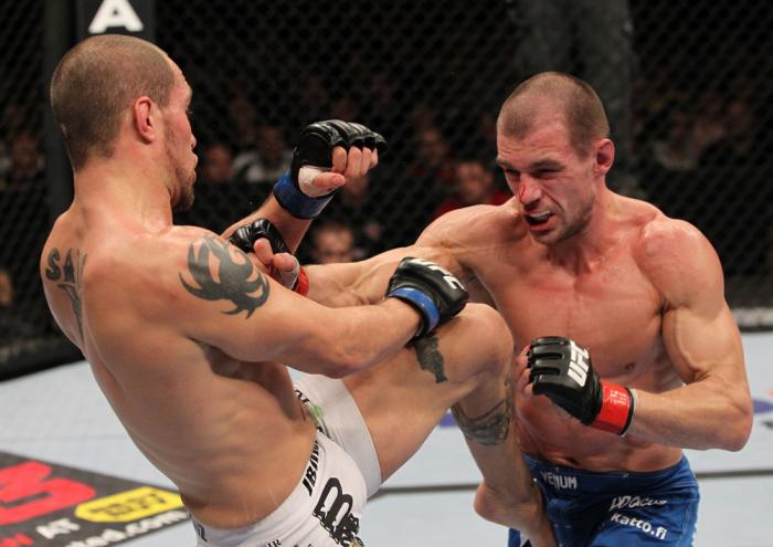 OMAHA, NE - FEBRUARY 15: (L-R) Justin Salas and Anton Kuivanen trade strikes during the UFC on FUEL TV event at Omaha Civic Auditorium on February 15, 2012 in Omaha, Nebraska. (Photo by Josh Hedges/Zuffa LLC/Zuffa LLC via Getty Images) *** Local Caption