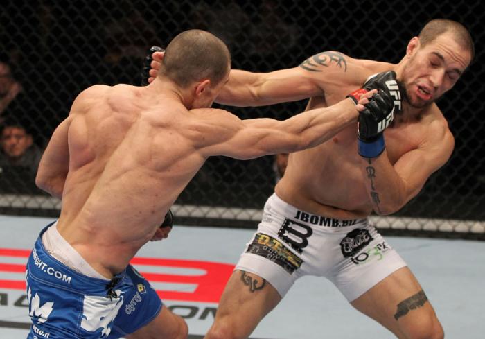 OMAHA, NE - FEBRUARY 15: (L-R) Anton Kuivanen punches Justin Salas during the UFC on FUEL TV event at Omaha Civic Auditorium on February 15, 2012 in Omaha, Nebraska. (Photo by Josh Hedges/Zuffa LLC/Zuffa LLC via Getty Images) *** Local Caption *** Anton