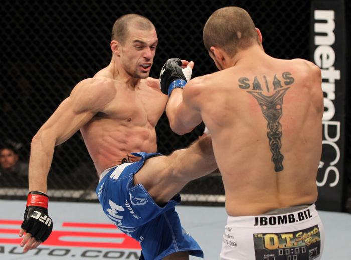 OMAHA, NE - FEBRUARY 15: (L-R) Anton Kuivanen kicks Justin Salas during the UFC on FUEL TV event at Omaha Civic Auditorium on February 15, 2012 in Omaha, Nebraska. (Photo by Josh Hedges/Zuffa LLC/Zuffa LLC via Getty Images) *** Local Caption *** Anton K