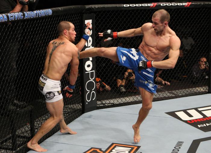 OMAHA, NE - FEBRUARY 15: (R-L) Anton Kuivanen kicks Justin Salas during the UFC on FUEL TV event at Omaha Civic Auditorium on February 15, 2012 in Omaha, Nebraska. (Photo by Josh Hedges/Zuffa LLC/Zuffa LLC via Getty Images) *** Local Caption *** Anton K