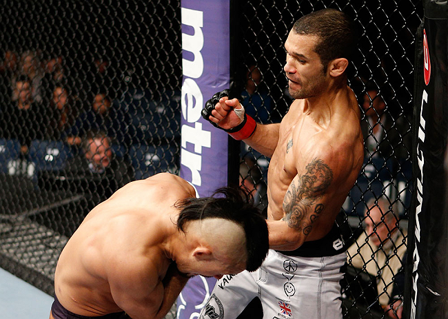 LONDON, ENGLAND - FEBRUARY 16: (R-L) Vaughan Lee punches Motonobu Tezuka in their bantamweight fight during the UFC on Fuel TV event on February 16, 2013 at Wembley Arena in London, England. (Photo by Josh Hedges/Zuffa LLC/Zuffa LLC via Getty Images)