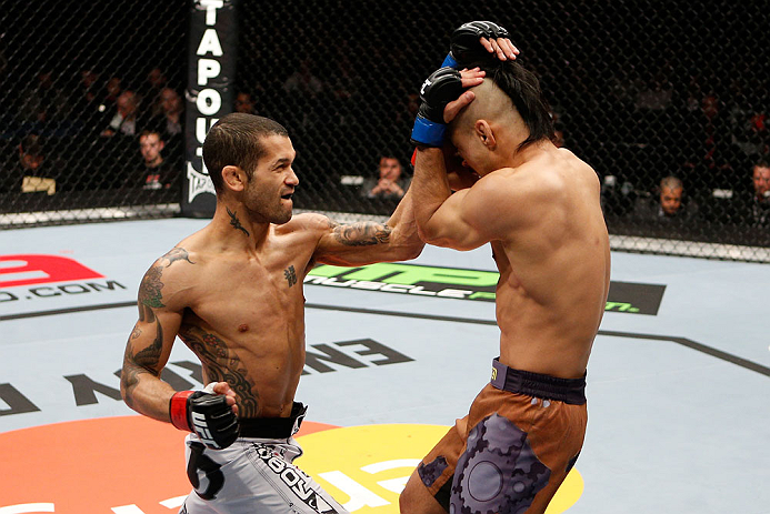 LONDON, ENGLAND - FEBRUARY 16: (L-R) Vaughan Lee punches Motonobu Tezuka in their bantamweight fight during the UFC on Fuel TV event on February 16, 2013 at Wembley Arena in London, England. (Photo by Josh Hedges/Zuffa LLC/Zuffa LLC via Getty Images)