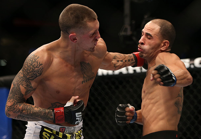 DENVER, CO - AUGUST 11: (L-R) Dustin Pague punches Chico Camus during their bantamweight bout at UFC 150 inside Pepsi Center on August 11, 2012 in Denver, Colorado. (Photo by Josh Hedges/Zuffa LLC/Zuffa LLC via Getty Images)