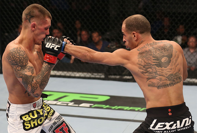 DENVER, CO - AUGUST 11: (R-L) Chico Camus punches Dustin Pague during their bantamweight bout at UFC 150 inside Pepsi Center on August 11, 2012 in Denver, Colorado. (Photo by Nick Laham/Zuffa LLC/Zuffa LLC via Getty Images)
