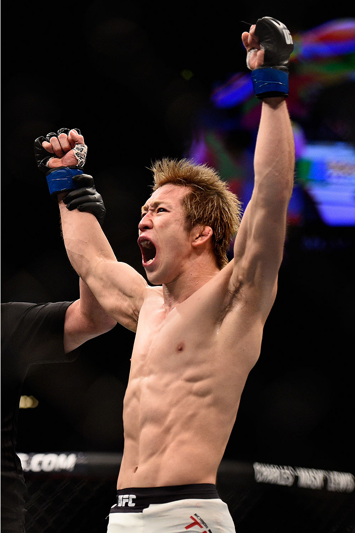 LAS VEGAS, NV - JANUARY 02: Michinori Tanaka of Japan reacts to his victory over Joe Soto in their bantamweight bout during the UFC 195 event inside MGM Grand Garden Arena on January 2, 2016 in Las Vegas, Nevada. (Photo by Jeff Bottari/Zuffa LLC/Zuffa LL