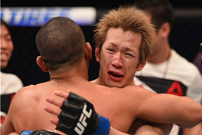 LAS VEGAS, NV - JANUARY 02: (L-R) Joe Soto and Michinori Tanaka of Japan congratulate one another after their bantamweight bout during the UFC 195 event inside MGM Grand Garden Arena on January 2, 2016 in Las Vegas, Nevada. (Photo by Josh Hedges/Zuffa L