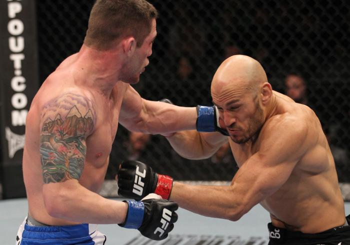 TORONTO, ON - DECEMBER 10: (L-R) Jake Hecht punches Rich Attonito during the UFC 140 event at Air Canada Centre on December 10, 2011 in Toronto, Ontario, Canada. (Photo by Nick Laham/Zuffa LLC/Zuffa LLC via Getty Images)
